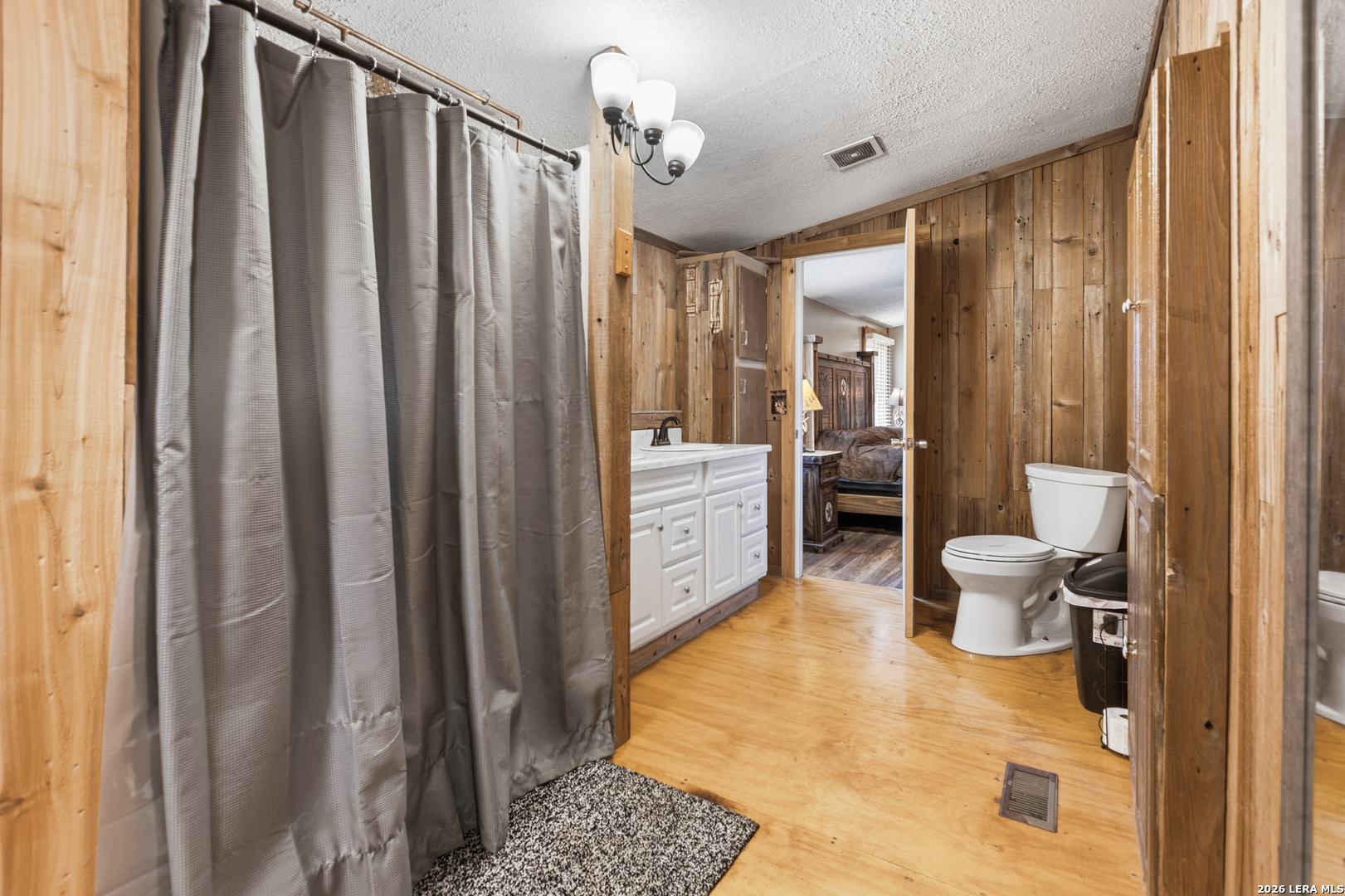 470 Lyon Road Seguin, TX 78155 - Photo 23 of 43 a bathroom with a sink toilet and shower
