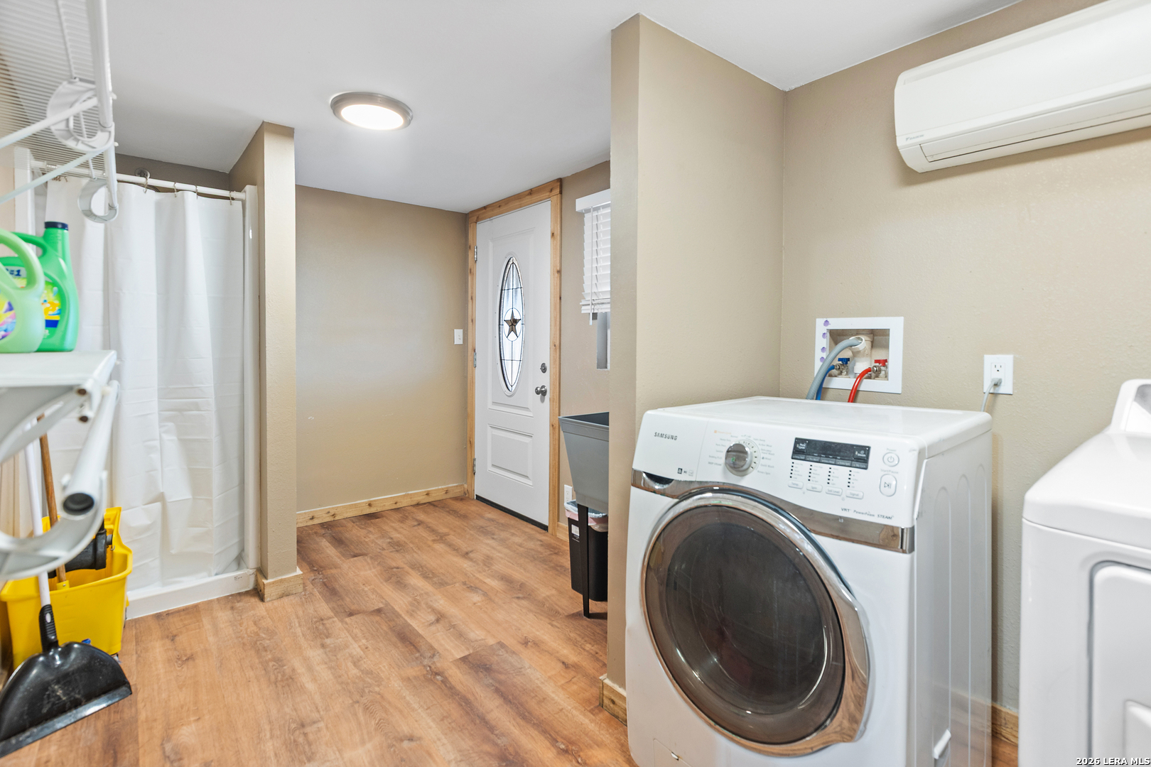 470 Lyon Road Seguin, TX 78155 - Photo 26 of 43 a view of a storage & utility room with washer and dryer