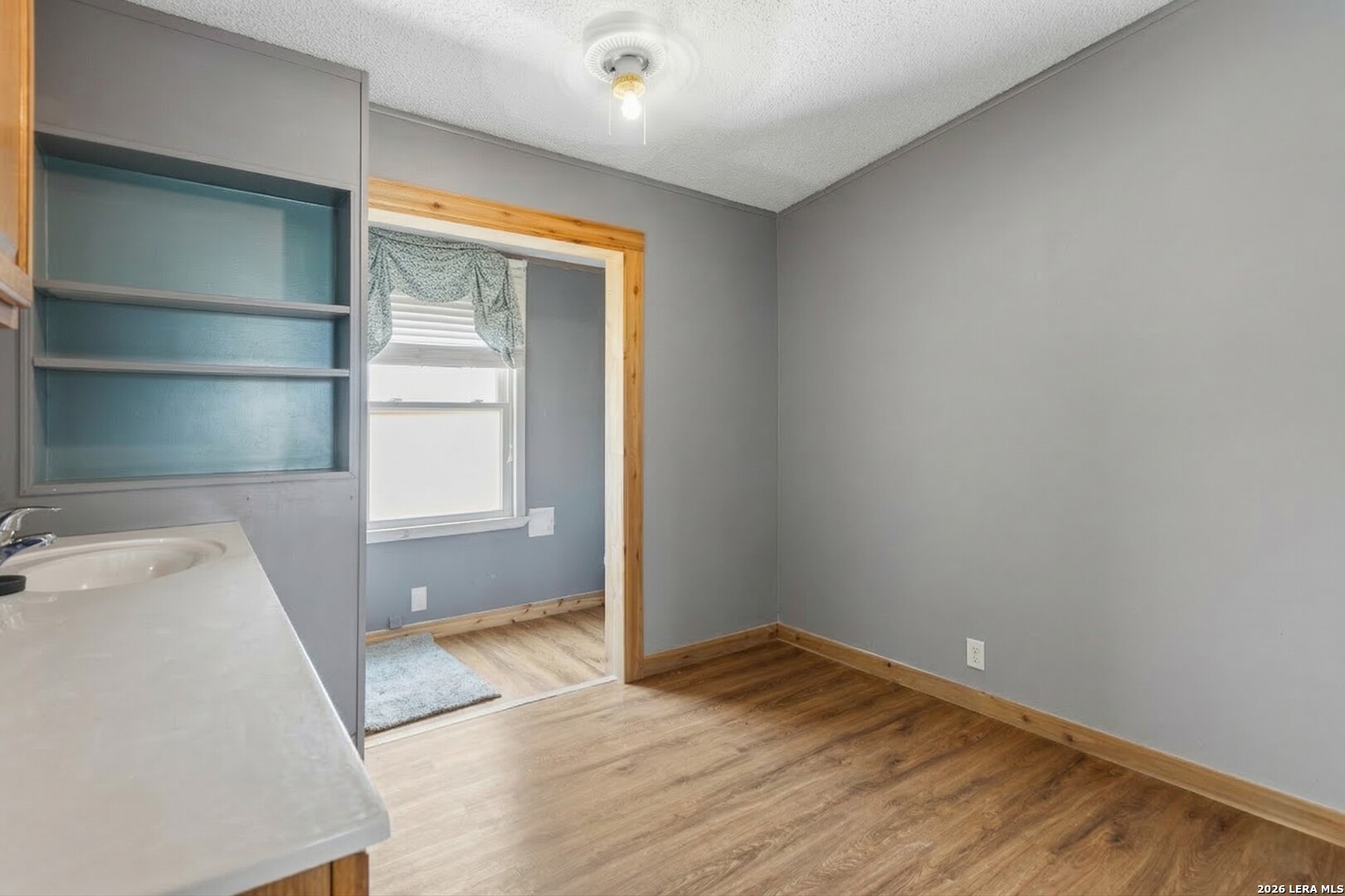 470 Lyon Road Seguin, TX 78155 - Photo 32 of 43 a view of empty room with wooden floor and fan