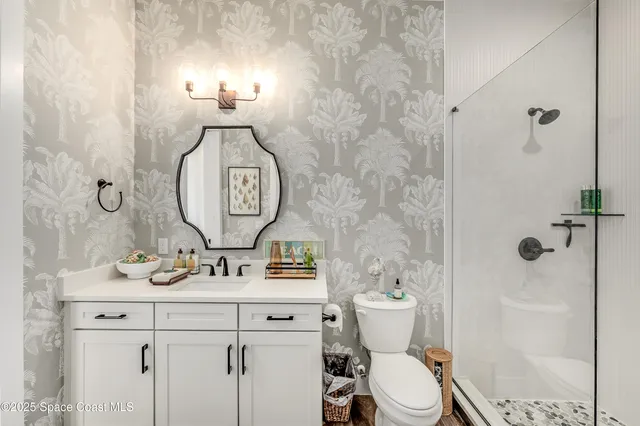 a bathroom with a toilet and a sink