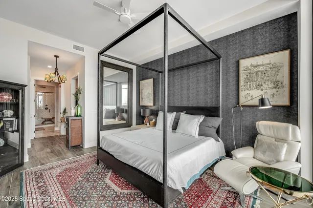 a living room with furniture and a rug