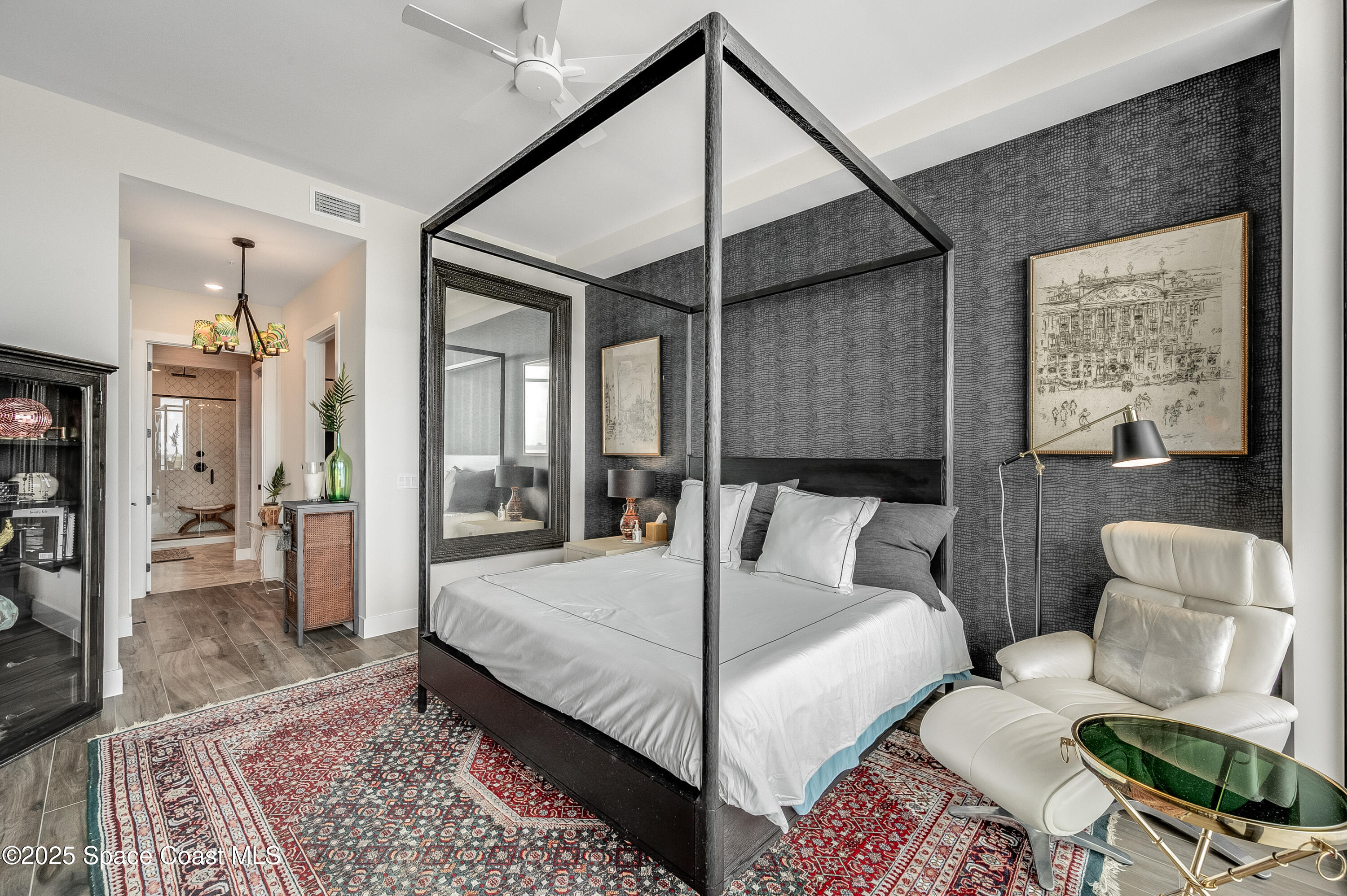 225 Strand Drive, Unit 404 Melbourne Beach, FL 32951 - Photo 18 of 51 a living room with furniture and a rug