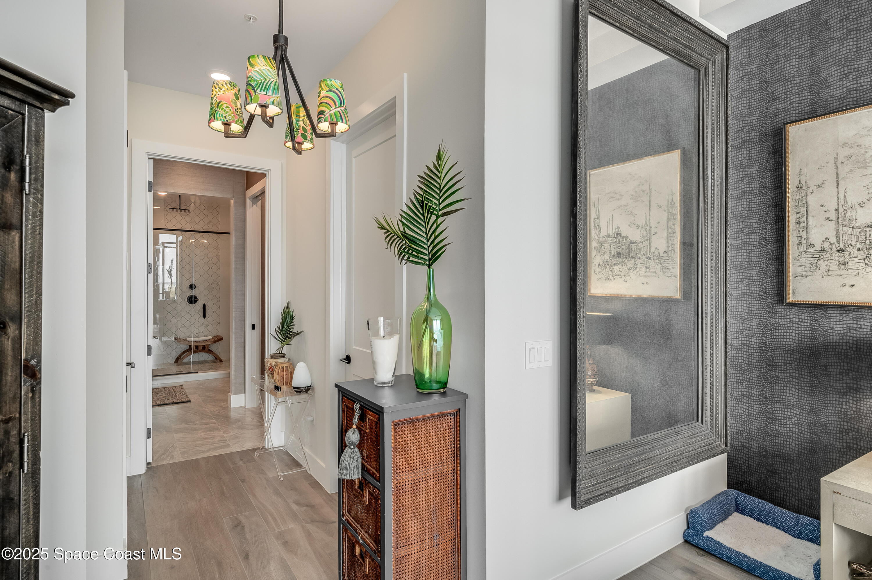 225 Strand Drive, Unit 404 Melbourne Beach, FL 32951 - Photo 20 of 51 view of hall way with mirror