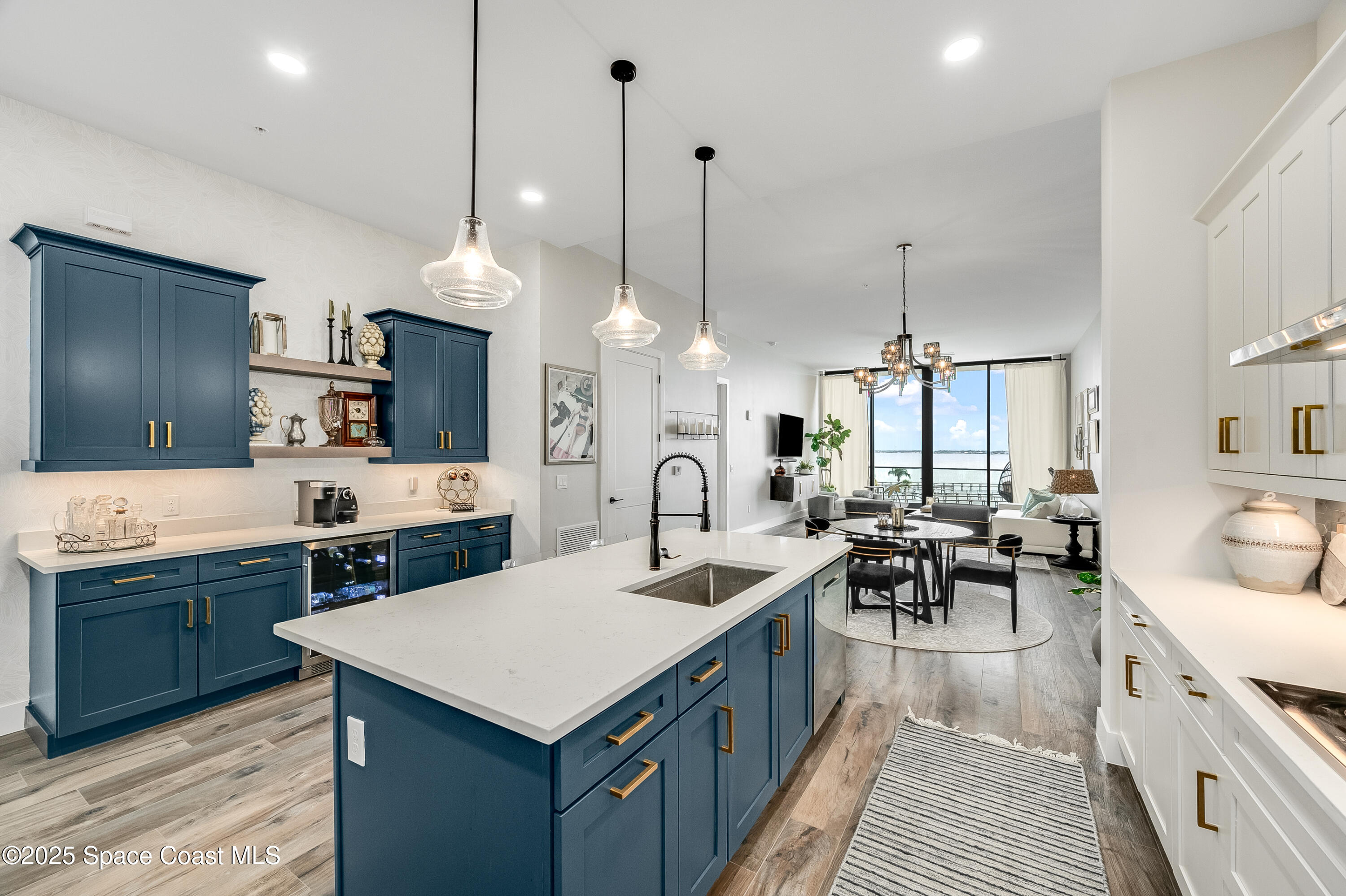 225 Strand Drive, Unit 404 Melbourne Beach, FL 32951 - Photo 32 of 51 a kitchen with lots of counter space and furniture
