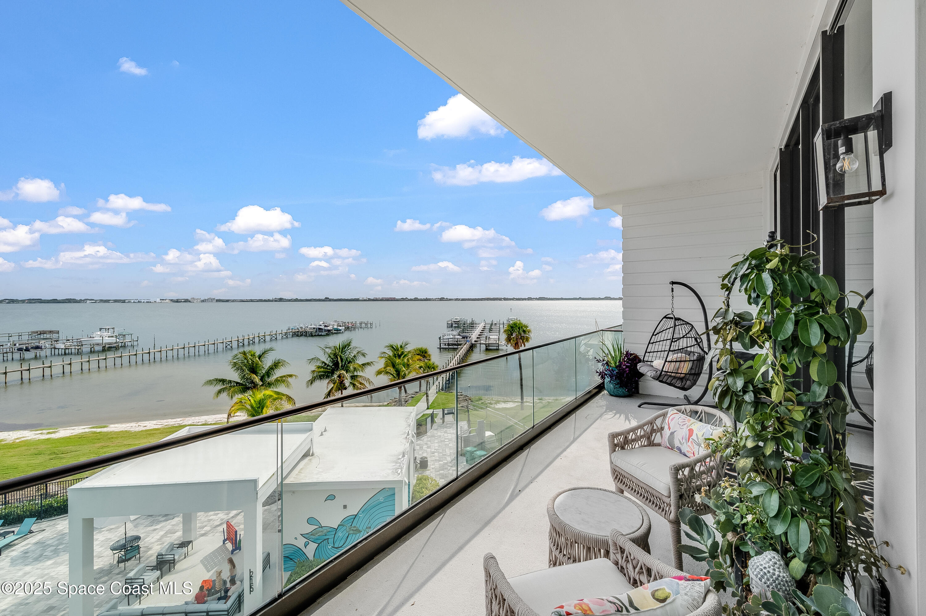 225 Strand Drive, Unit 404 Melbourne Beach, FL 32951 - Photo 41 of 51 a view of swimming pool with an outdoor seating