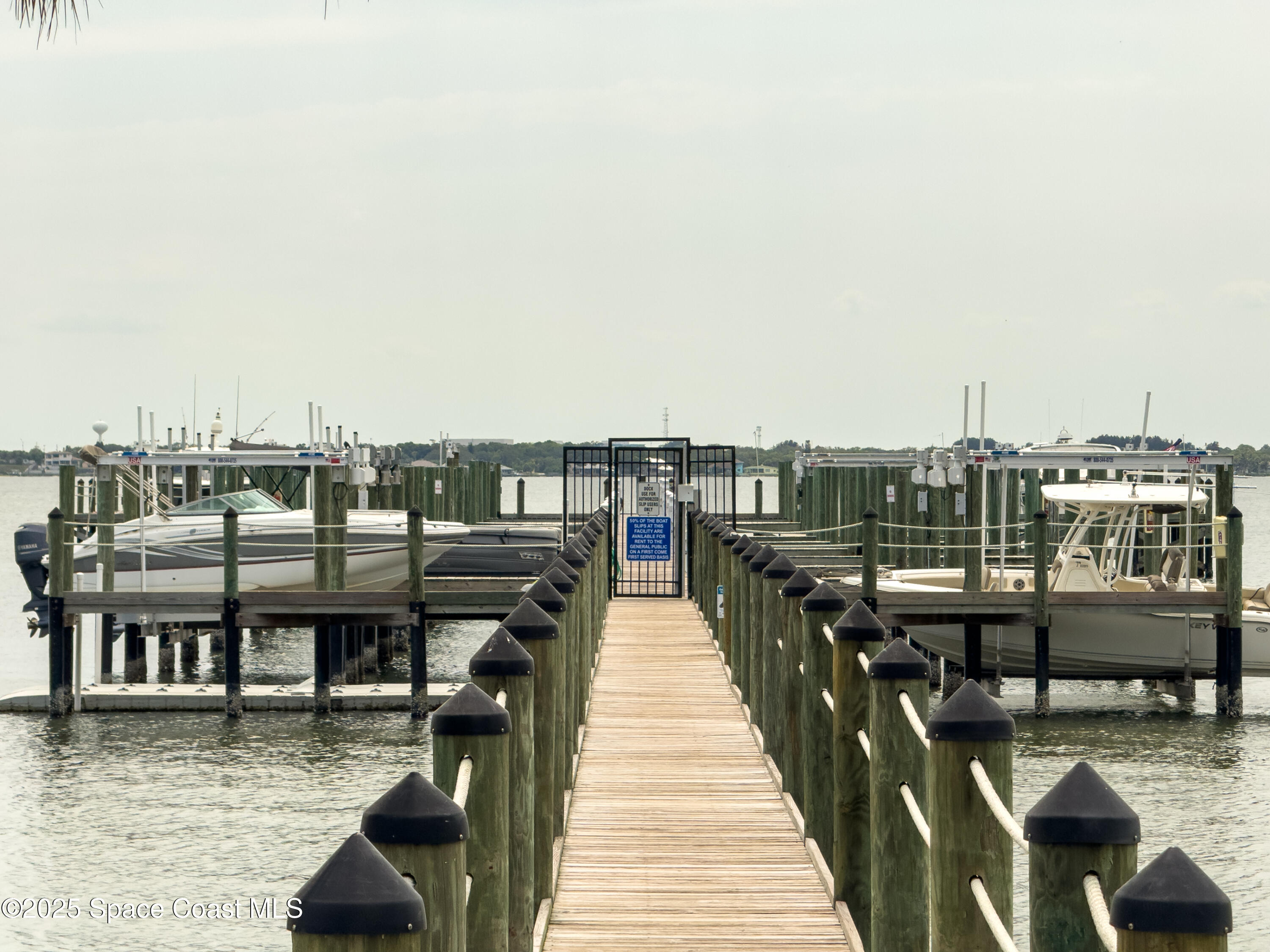 225 Strand Drive, Unit 404 Melbourne Beach, FL 32951 - Photo 43 of 51 a view of a balcony with chairs