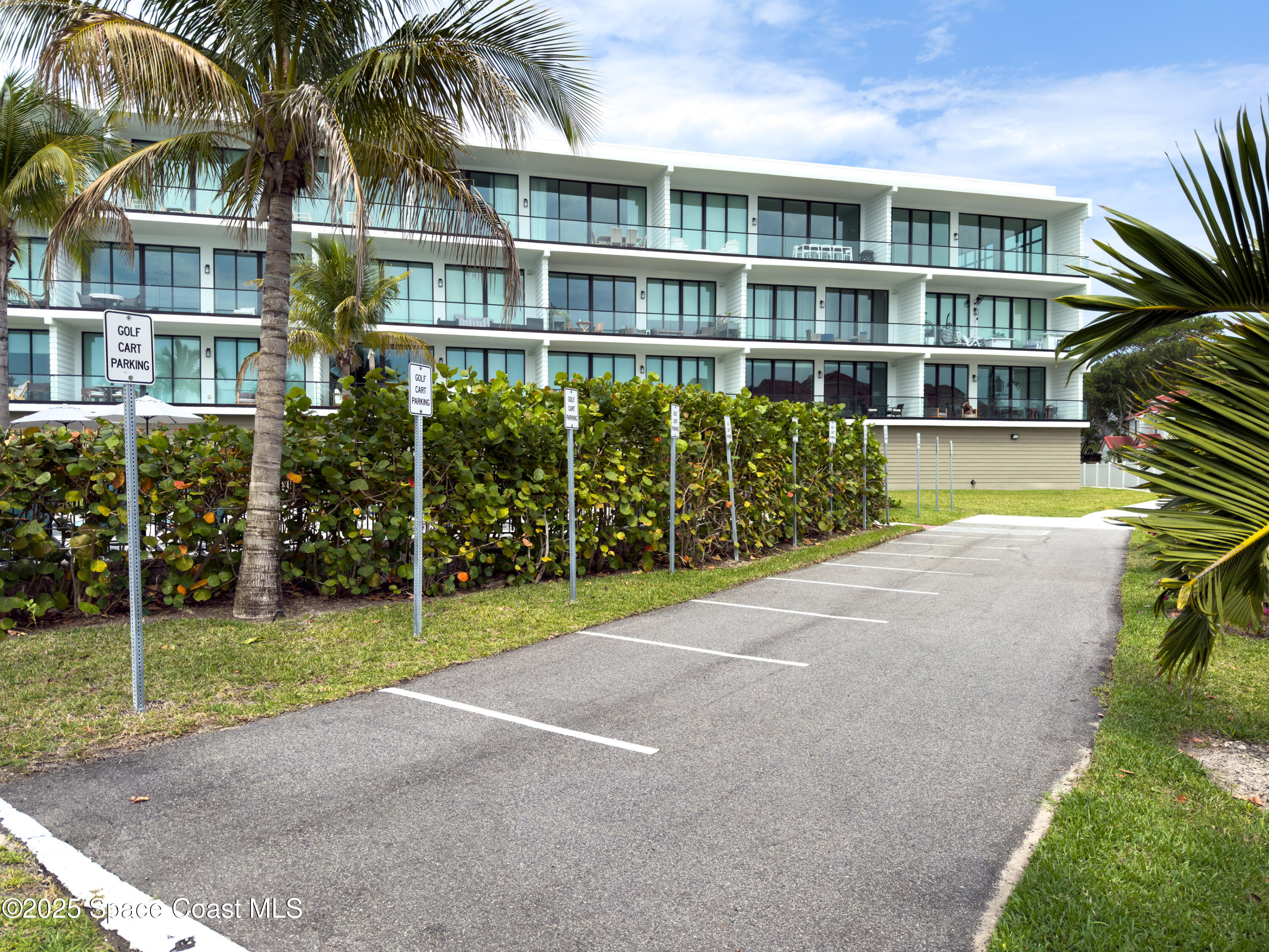 225 Strand Drive, Unit 404 Melbourne Beach, FL 32951 - Photo 44 of 51 a view of a multi story building