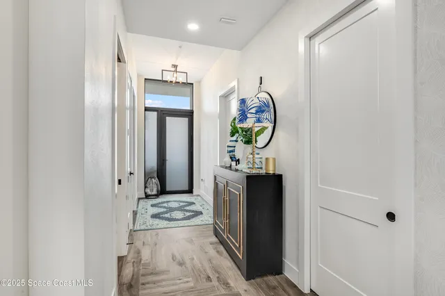 a hallway with painting and a decor