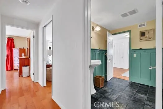 a view of an entryway door and hallway
