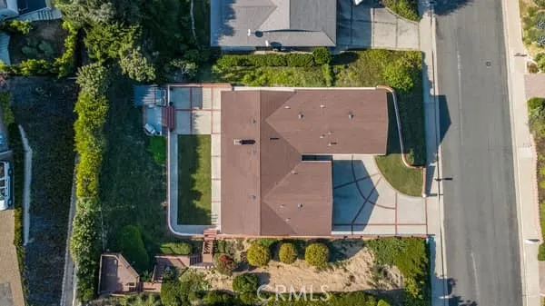an aerial view of residential building with ocean view