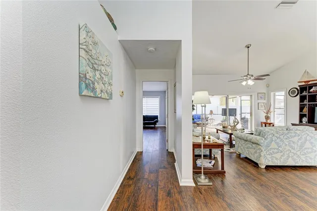 a bathroom with a toilet a sink a shower and a mirror