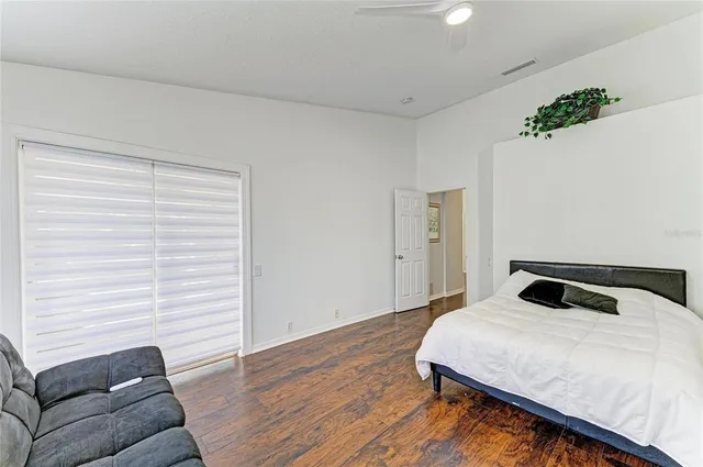 a workspace with furniture hardwood and a window