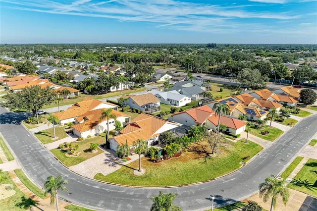 a house with swimming pool in front of it