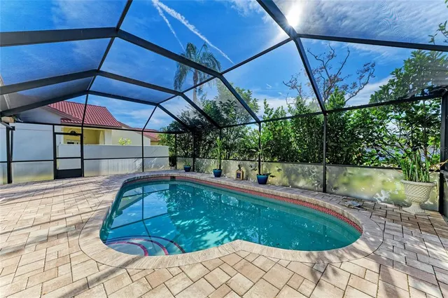 a living room with lots of furniture and a table