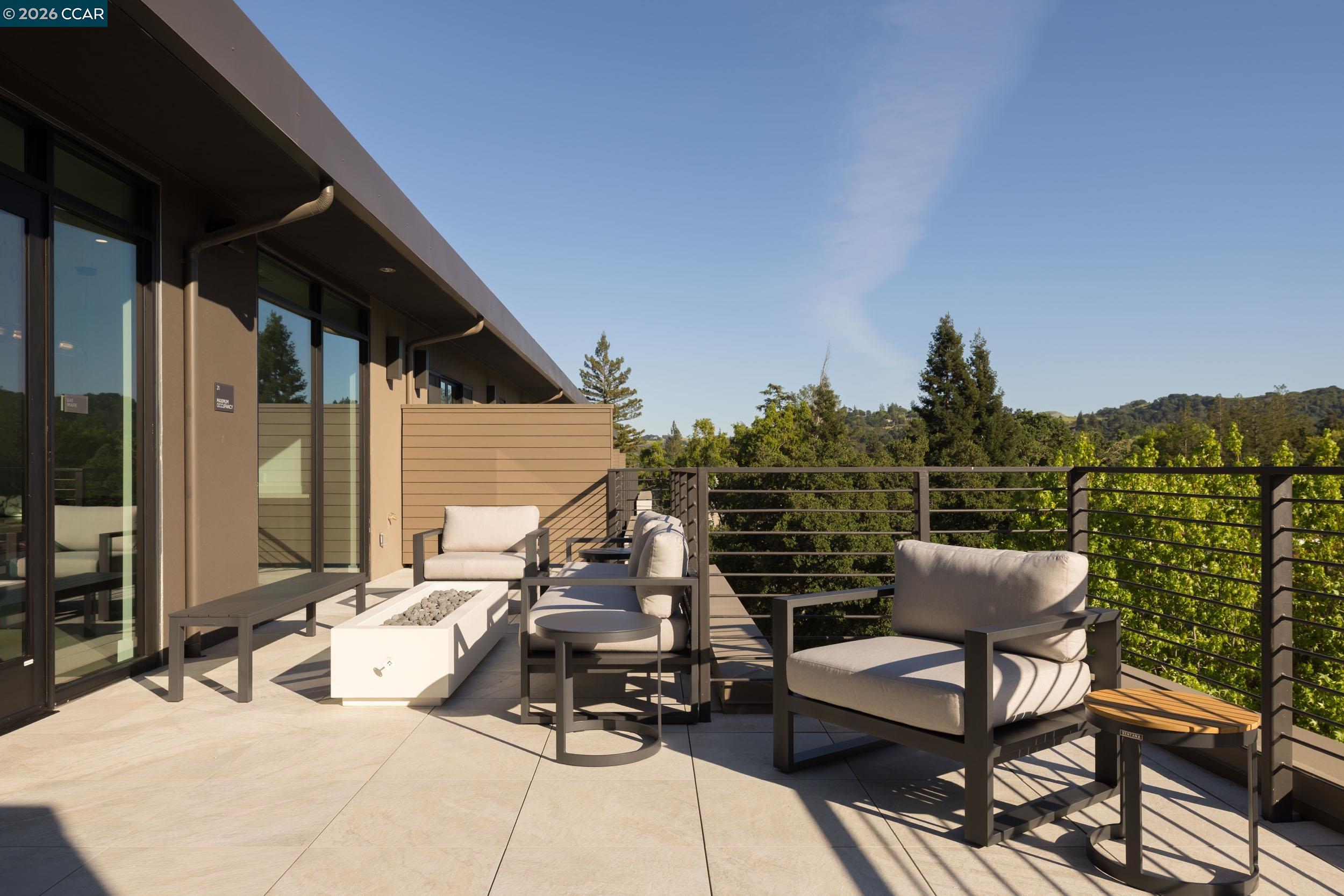 950 Hough Avenue, Unit 202 Lafayette, CA 94549 - Photo 35 of 38 a view of a chairs and table in the patio