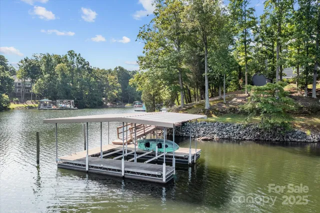 a view of a lake with a yard
