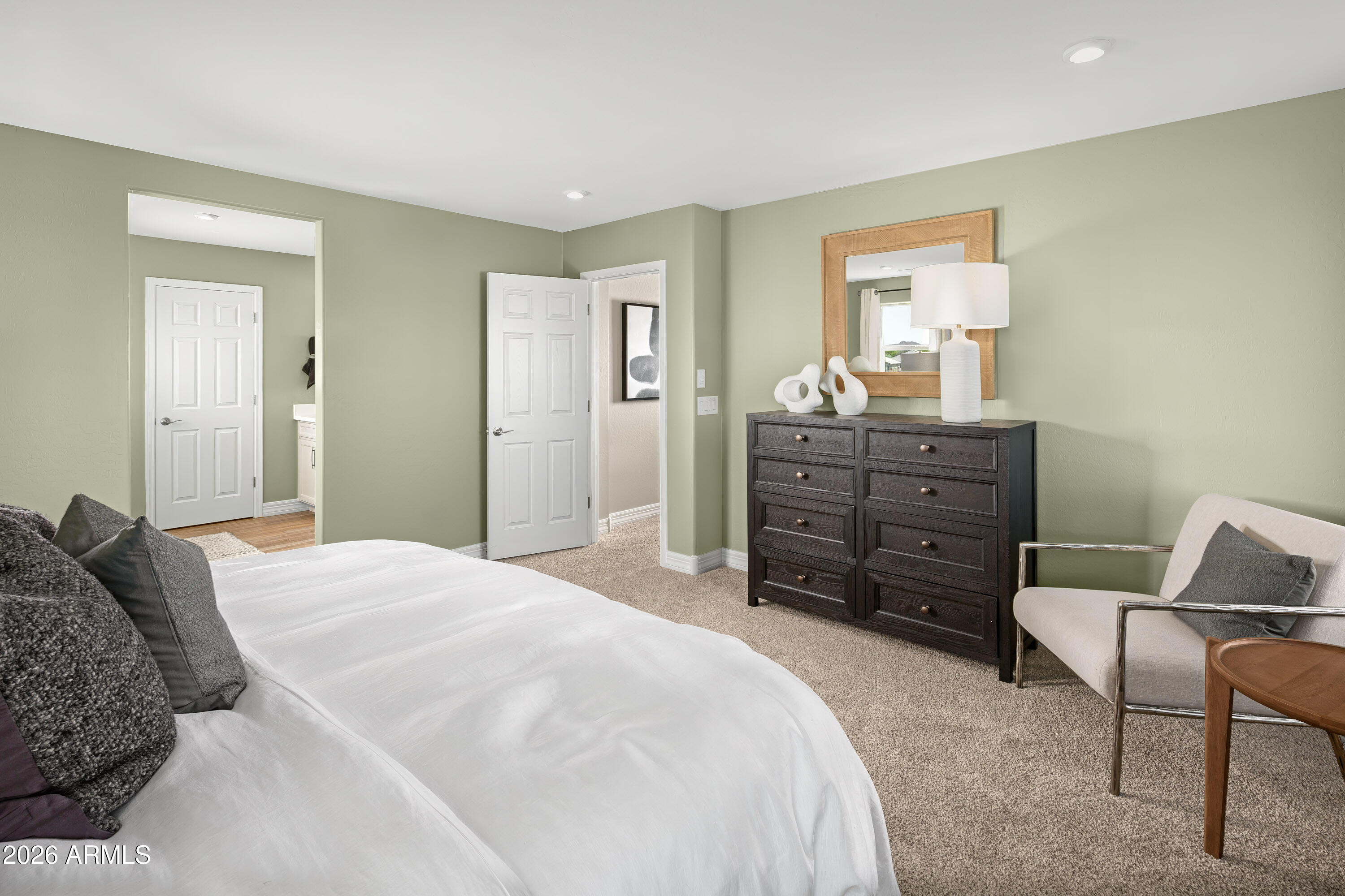 18828 North Ponte Road Maricopa, AZ 85138 - Photo 12 of 25 a bedroom with a bed and furniture