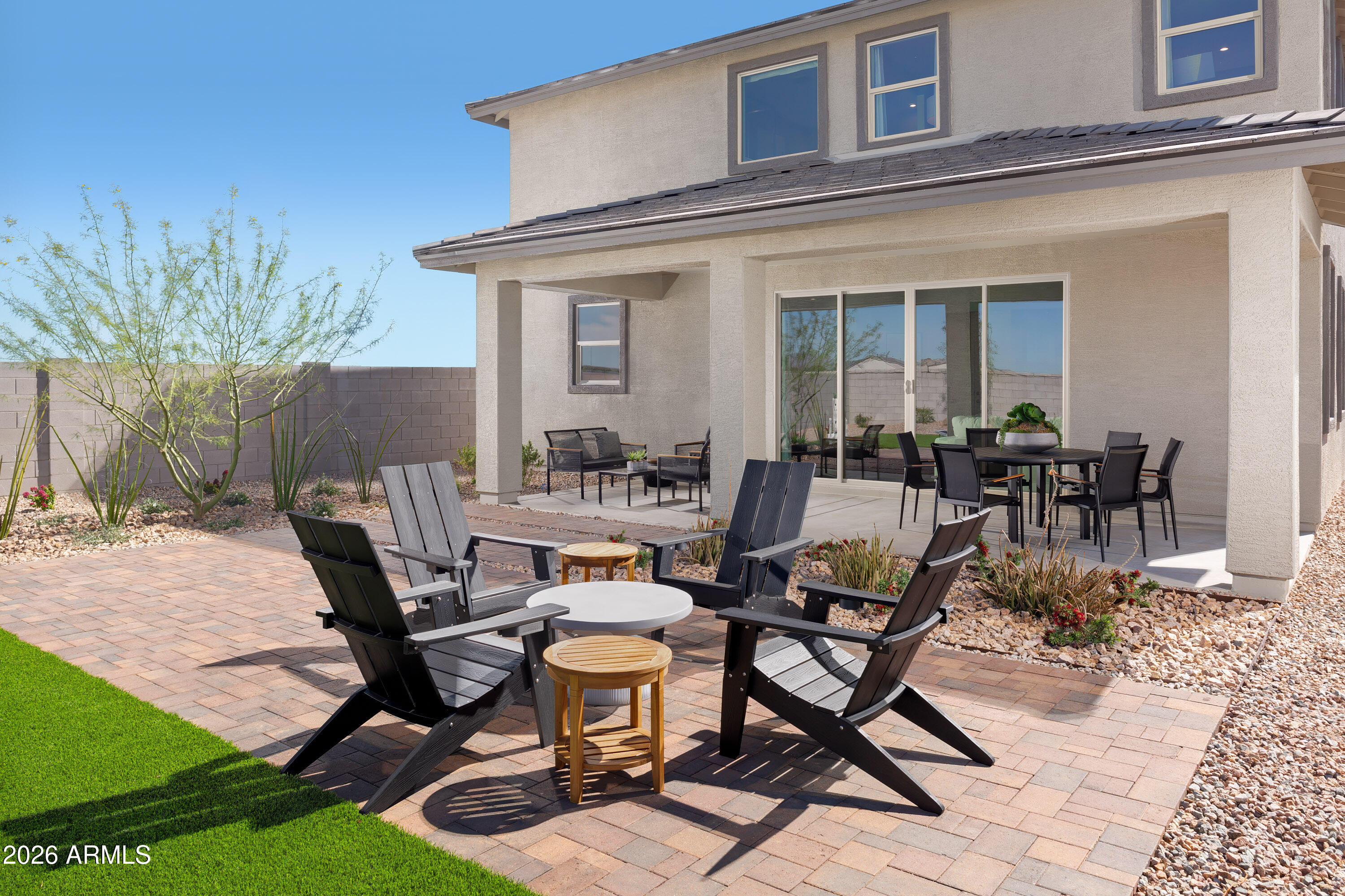 18828 North Ponte Road Maricopa, AZ 85138 - Photo 15 of 25 a view of a backyard with furniture
