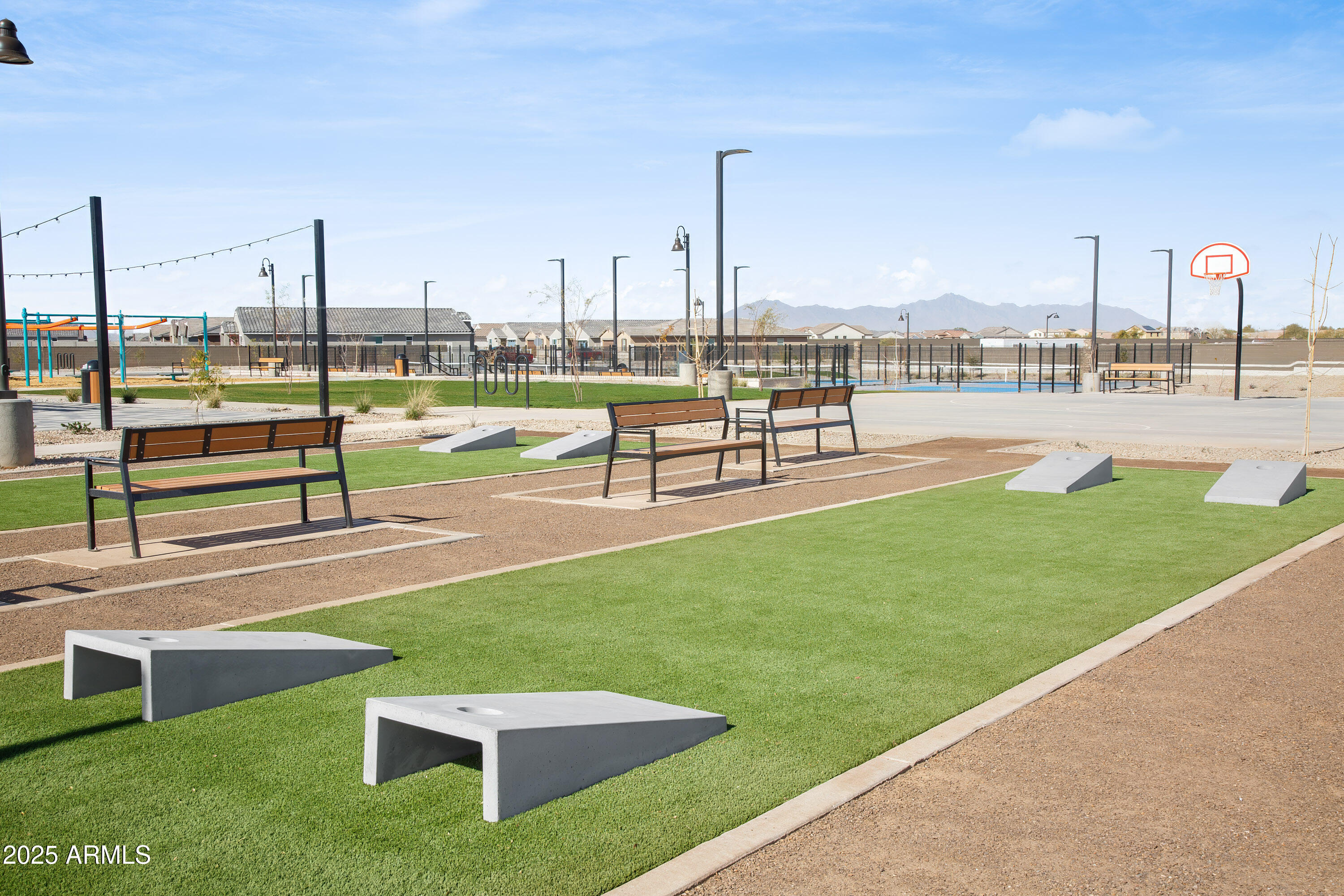 18828 North Ponte Road Maricopa, AZ 85138 - Photo 17 of 25 a view of a patio with a garden and plants