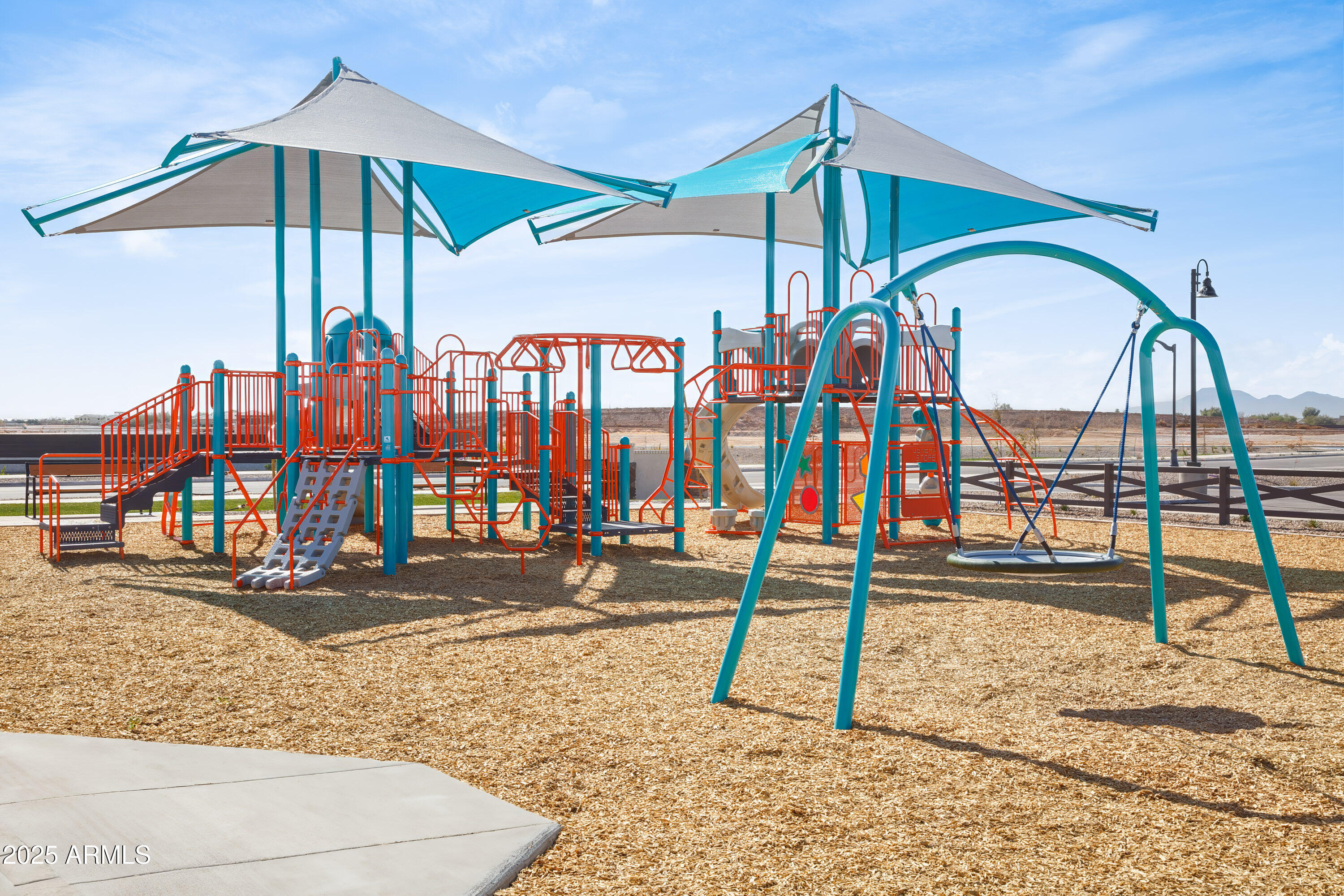 18828 North Ponte Road Maricopa, AZ 85138 - Photo 19 of 25 a view of a park with slide