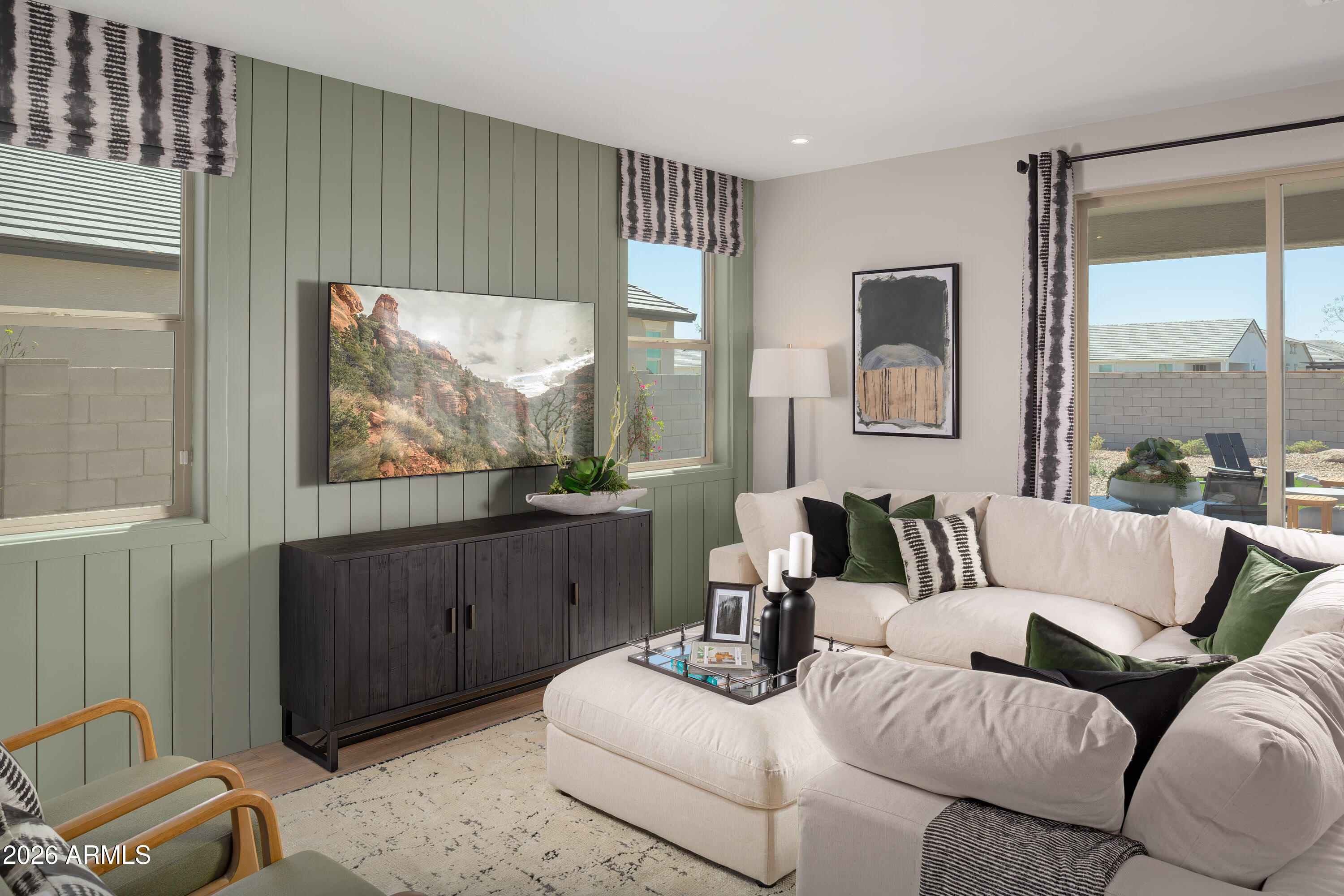 18828 North Ponte Road Maricopa, AZ 85138 - Photo 8 of 25 a living room with furniture and a window