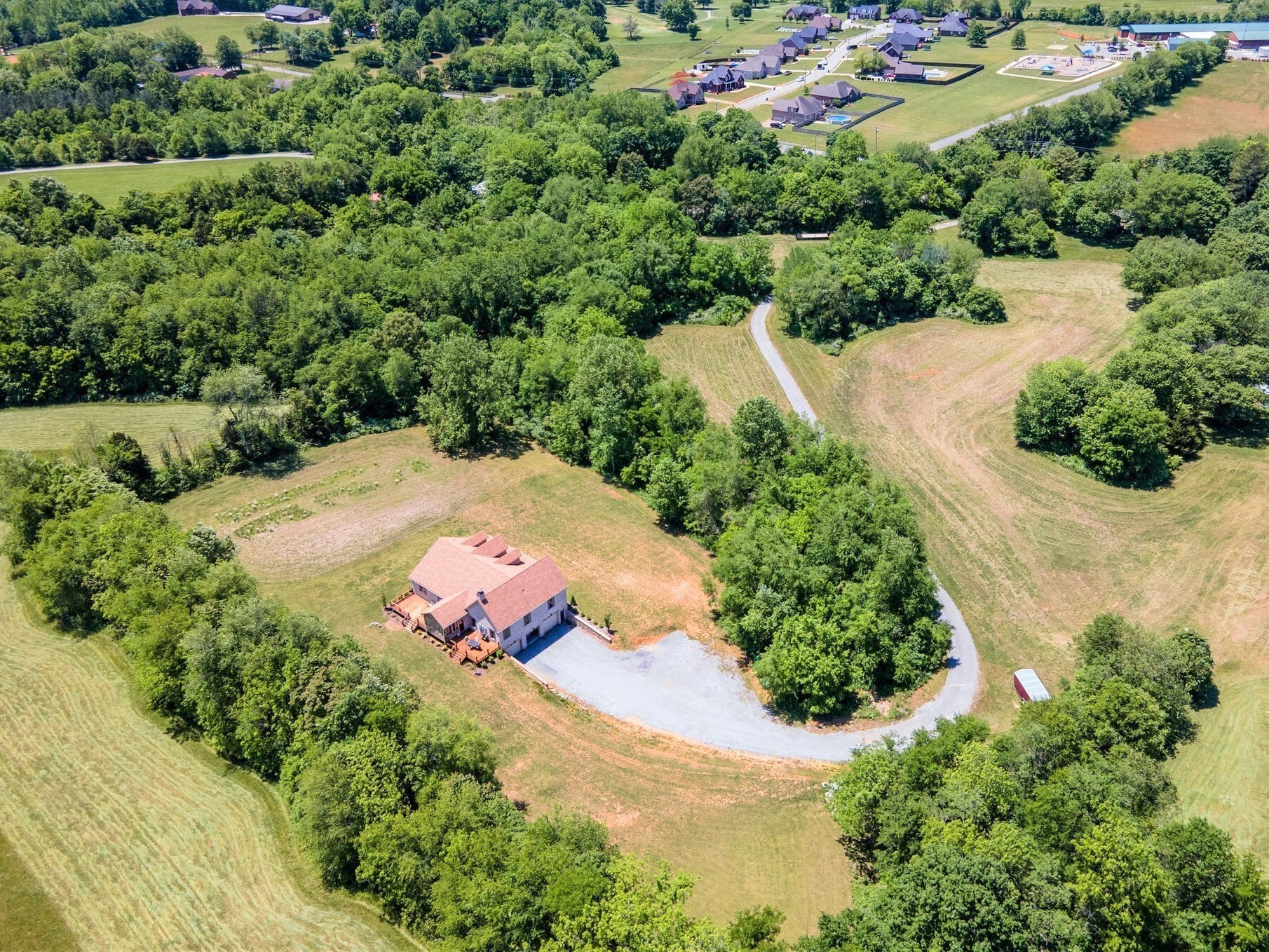 an aerial view of residential house with outdoor space