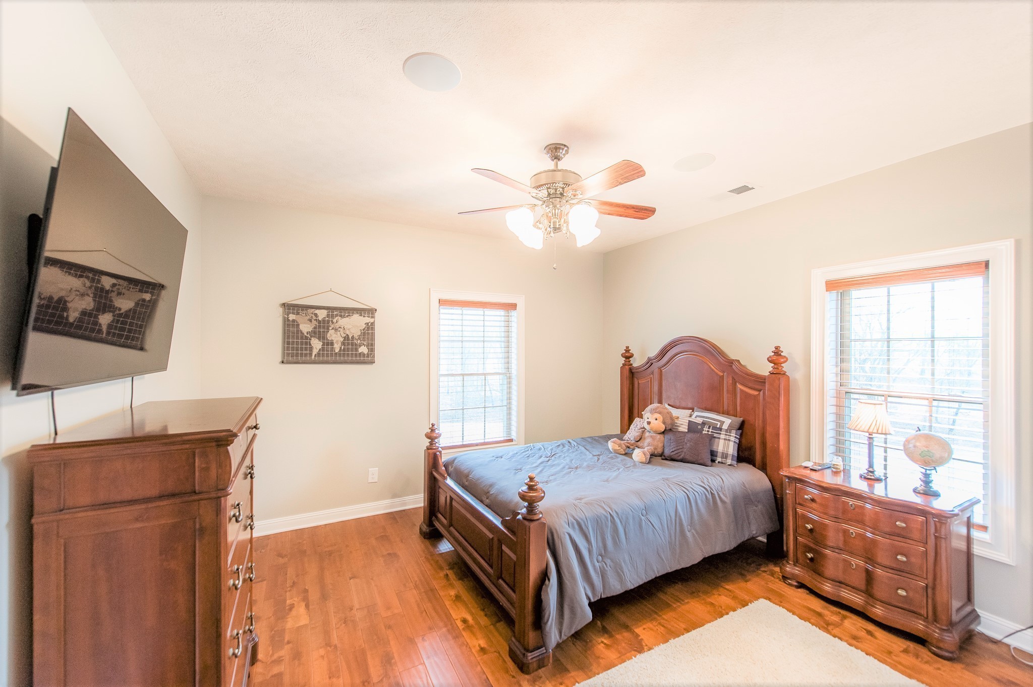 800 Butler Road Portland, TN 37148 - Photo 24 of 38 a bedroom with a bed chandelier and a window