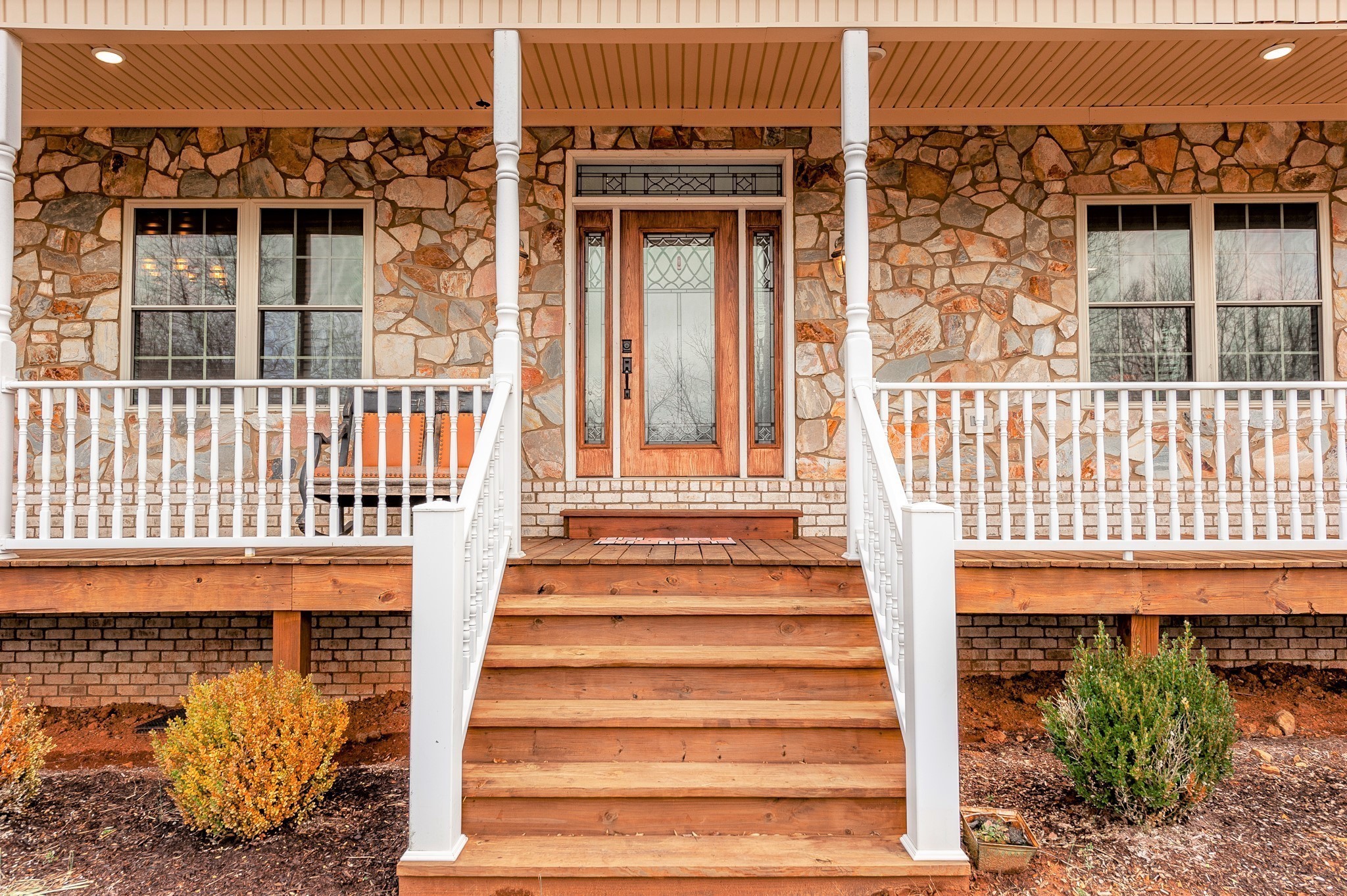 800 Butler Road Portland, TN 37148 - Photo 9 of 38 a view of a brick house with large windows