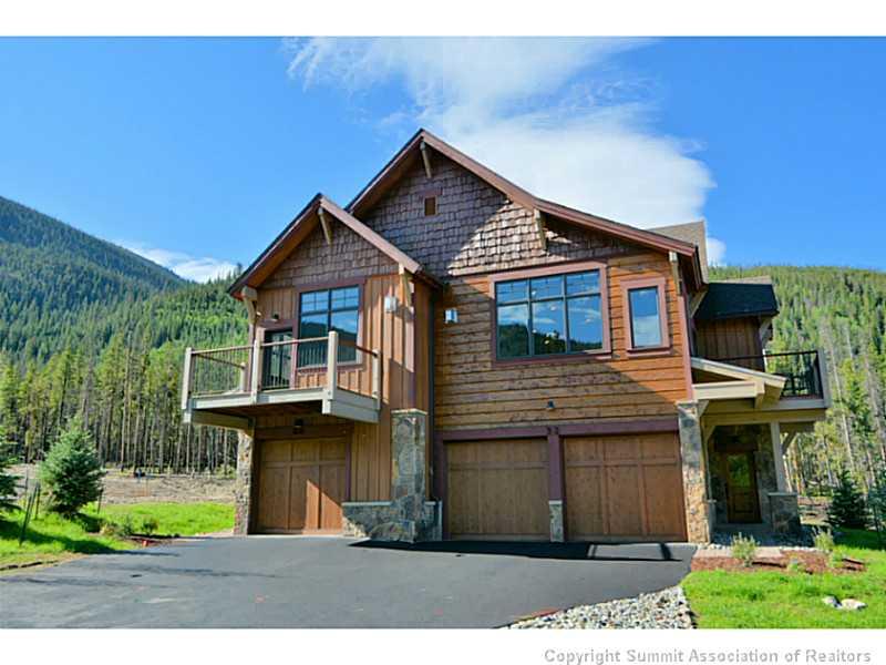 853 Independence Road, Unit 5B Keystone, CO 80435 - Photo 1 of 25 a front view of a house with a yard