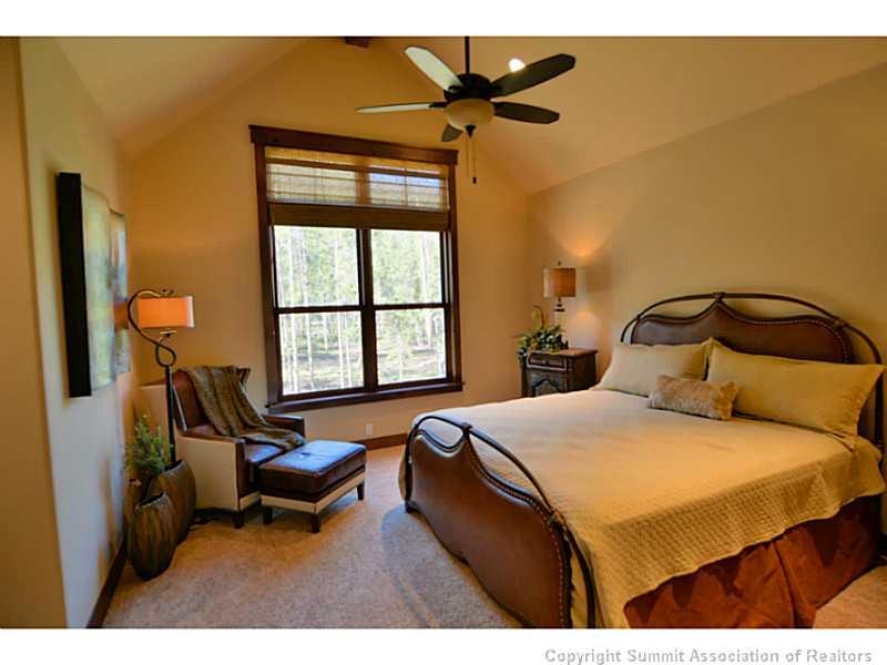 853 Independence Road, Unit 5B Keystone, CO 80435 - Photo 13 of 25 a bedroom with a bed and a couch