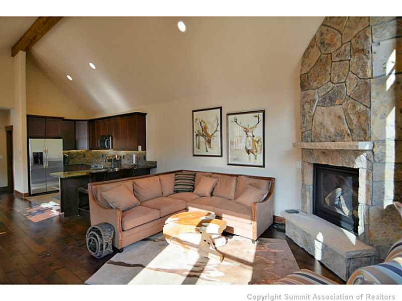 853 Independence Road, Unit 5B Keystone, CO 80435 - Photo 6 of 25 a living room with furniture and a fireplace