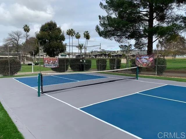 a house view with a a park