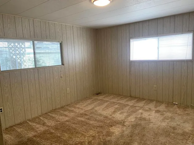 a bathroom with a shower and a toilet