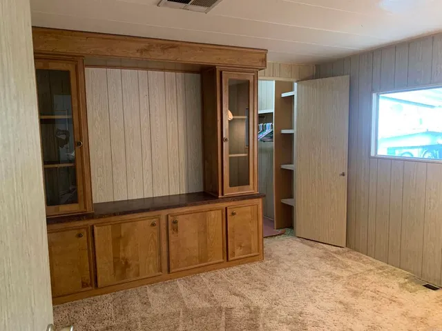 a view of houses with a city view