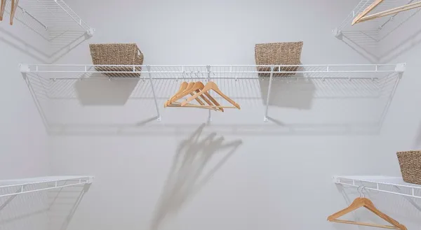 a view of a room with racks on the wall