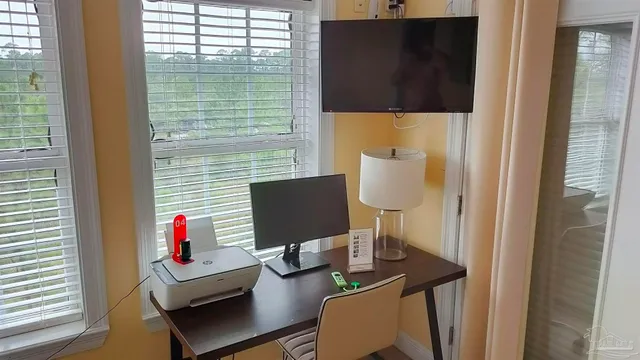 a view of a house with a street