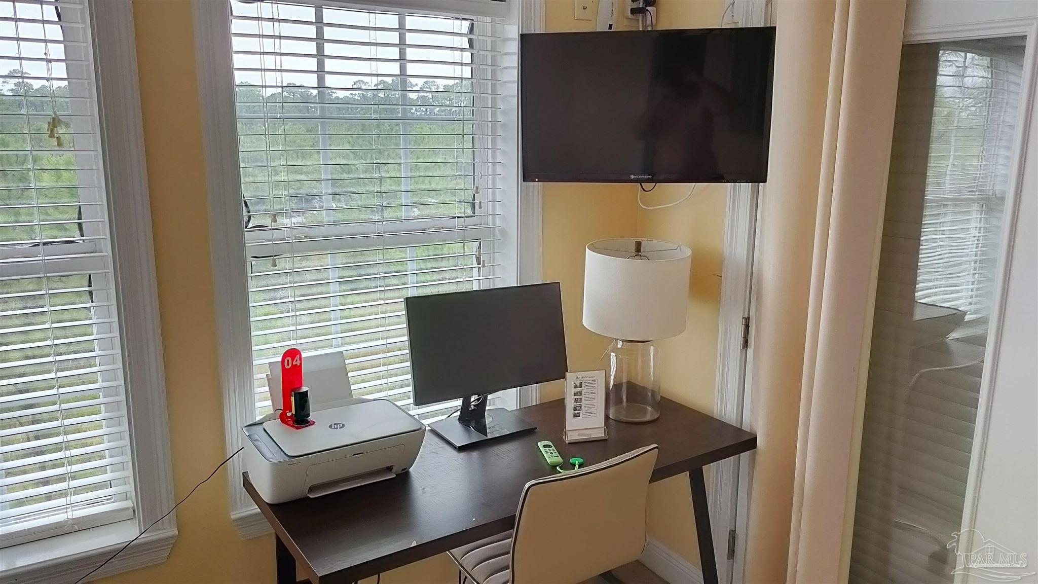 864 Sailfish Court Perdido Key, FL 32507 - Photo 26 of 40 a view of a workspace with furniture and a window
