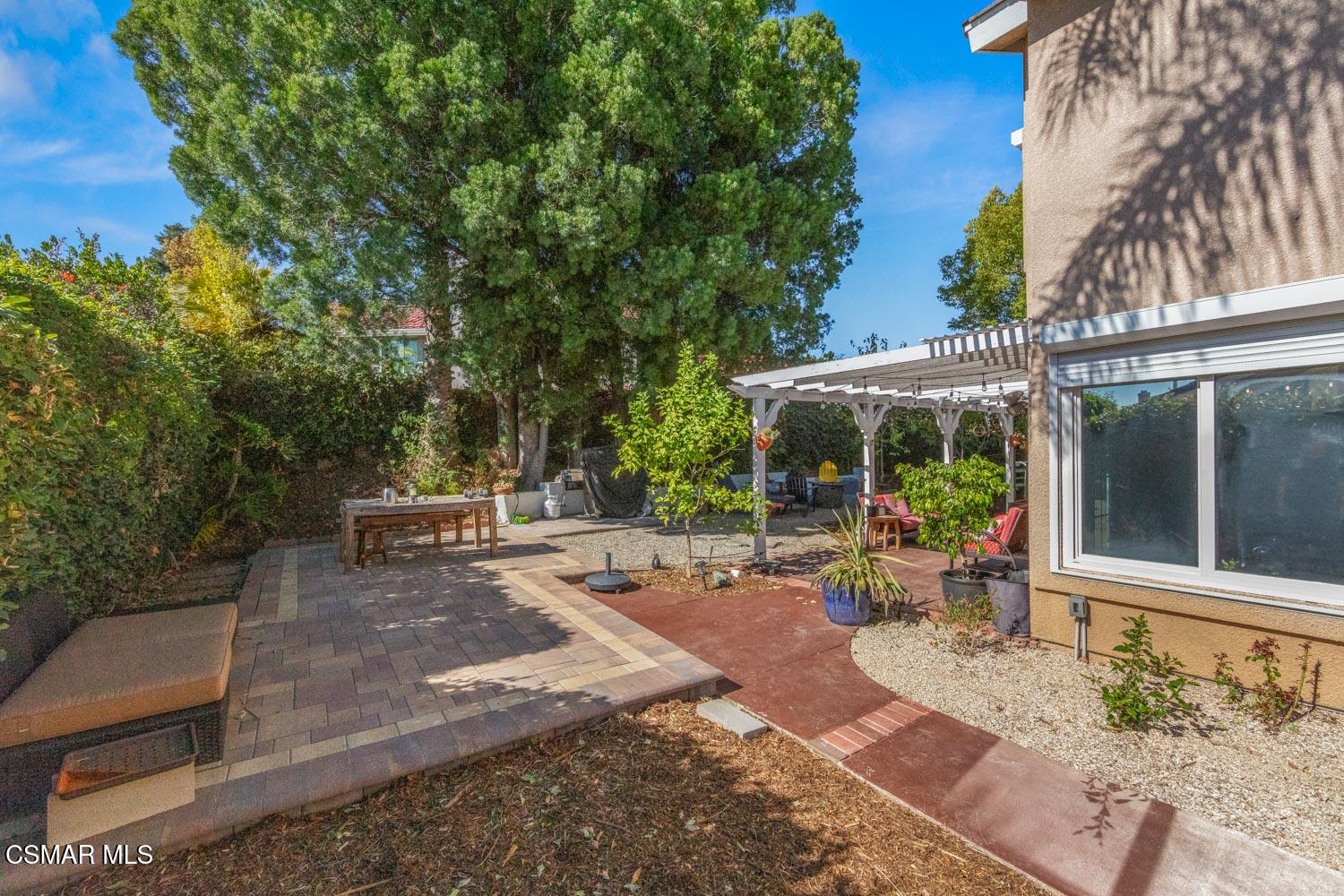 3037 Klamath Avenue Simi Valley, CA 93063 - Photo 33 of 38 a view of a backyard with sitting area