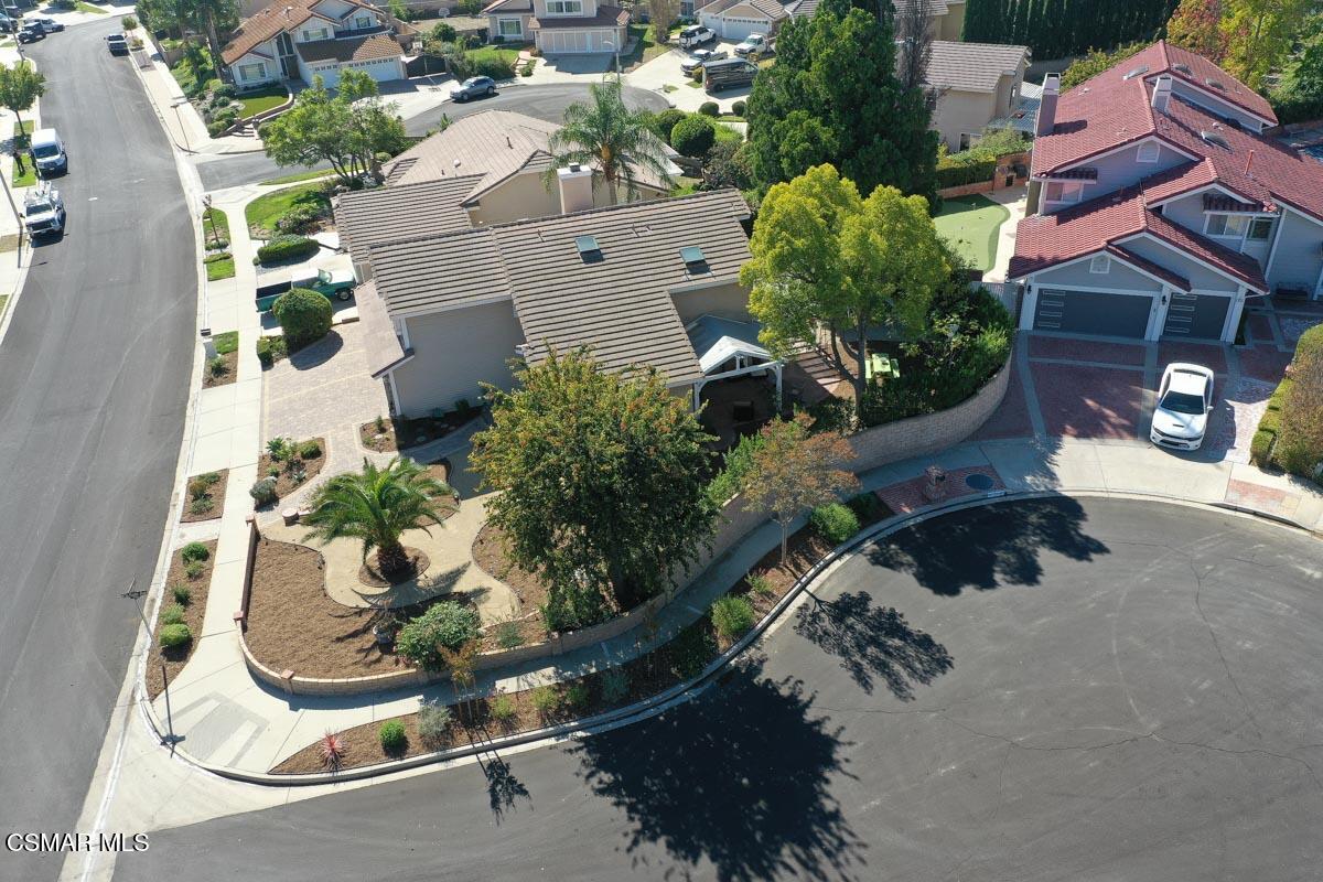 3037 Klamath Avenue Simi Valley, CA 93063 - Photo 34 of 38 an aerial view of a house with a yard and garden