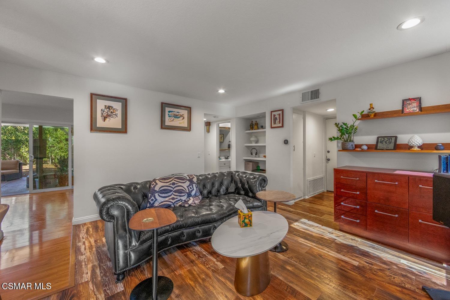3037 Klamath Avenue Simi Valley, CA 93063 - Photo 9 of 38 a living room with furniture and wooden floor