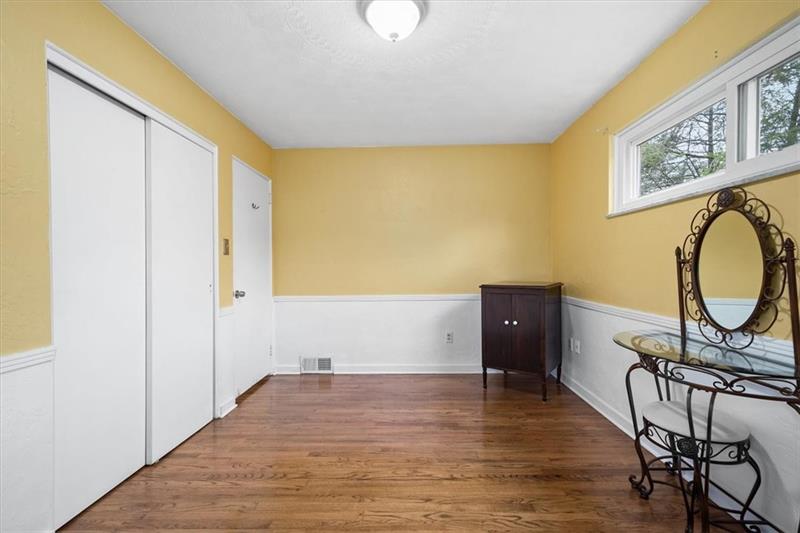 209 Cherokee Road Pittsburgh, PA 15241 - Photo 22 of 41 a view of a room with furniture and wooden floor