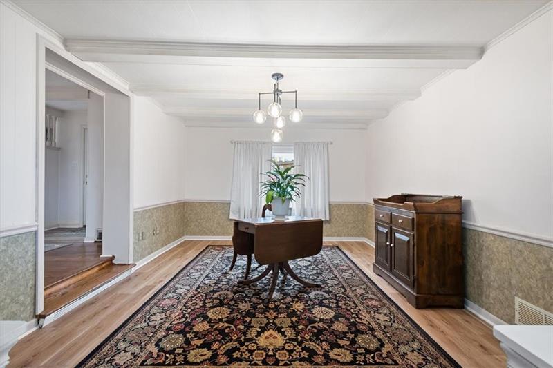 209 Cherokee Road Pittsburgh, PA 15241 - Photo 7 of 41 a living room with furniture and a chandelier