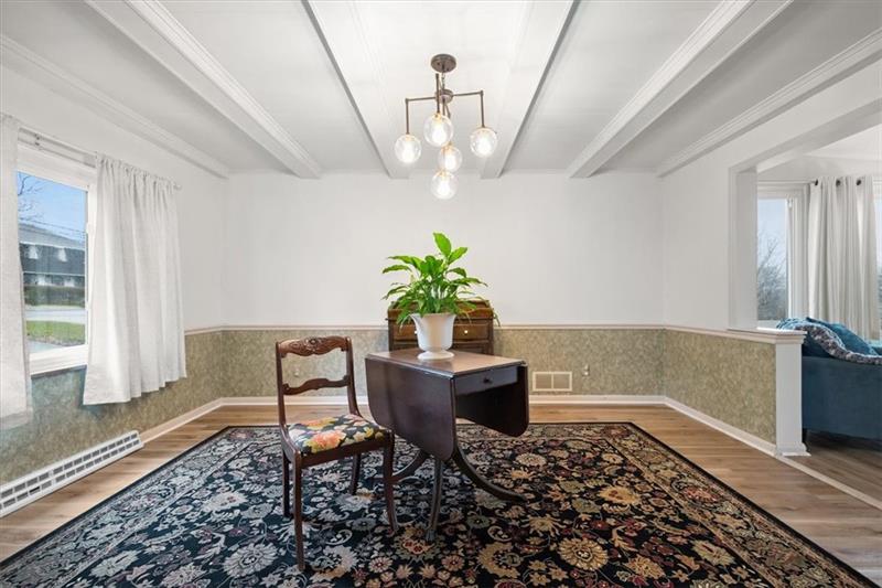 209 Cherokee Road Pittsburgh, PA 15241 - Photo 8 of 41 a living room with furniture and a chandelier