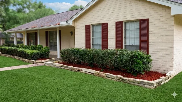 a front view of house with yard and green space