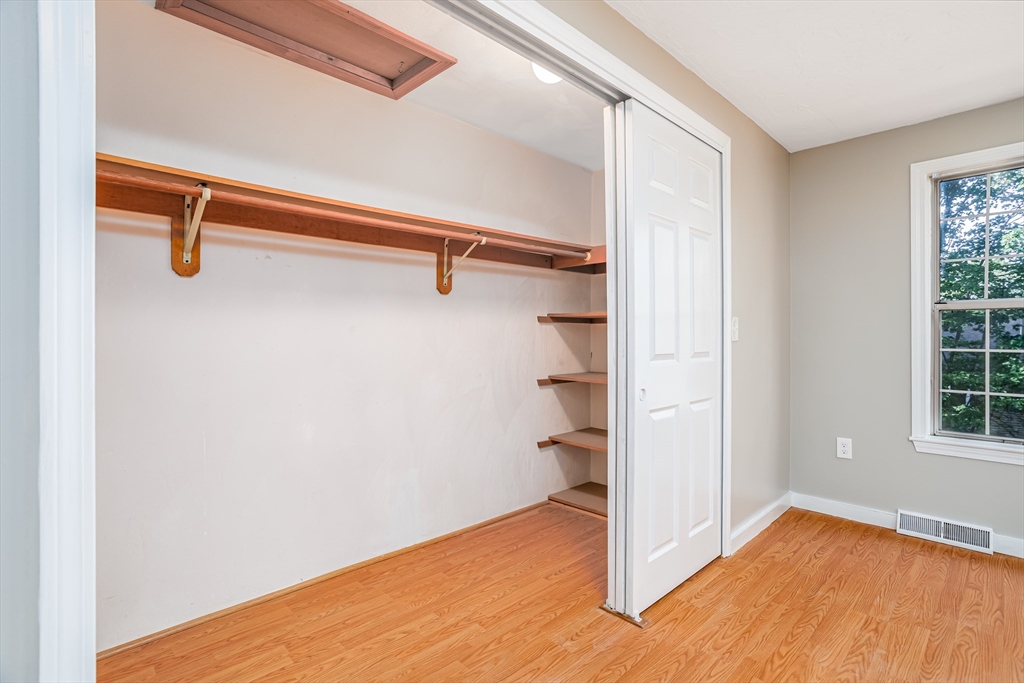 516 Ridgefield Circle, Unit C Clinton, MA 01510 - Photo 20 of 36 a view of a room with empty racks
