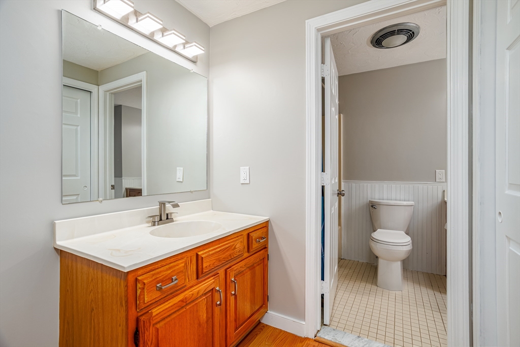 516 Ridgefield Circle, Unit C Clinton, MA 01510 - Photo 22 of 36 a bathroom with a sink a toilet and shower
