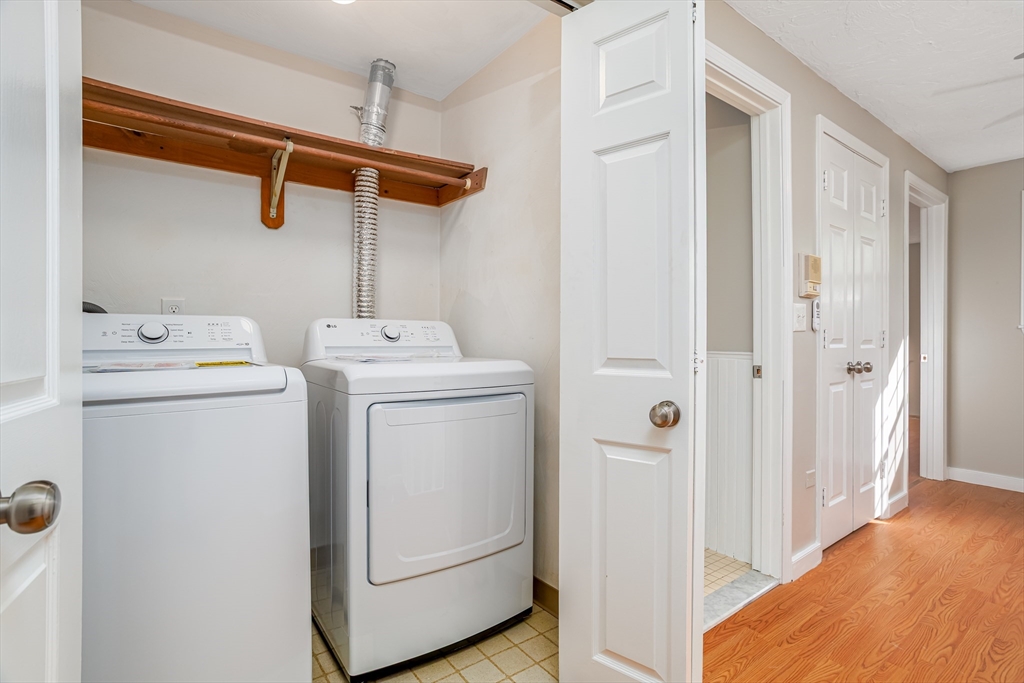 516 Ridgefield Circle, Unit C Clinton, MA 01510 - Photo 27 of 36 a utility room with dryer and washer
