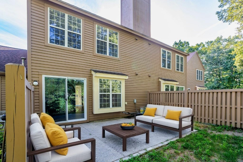 516 Ridgefield Circle, Unit C Clinton, MA 01510 - Photo 30 of 36 a outdoor living space with patio furniture and garden view