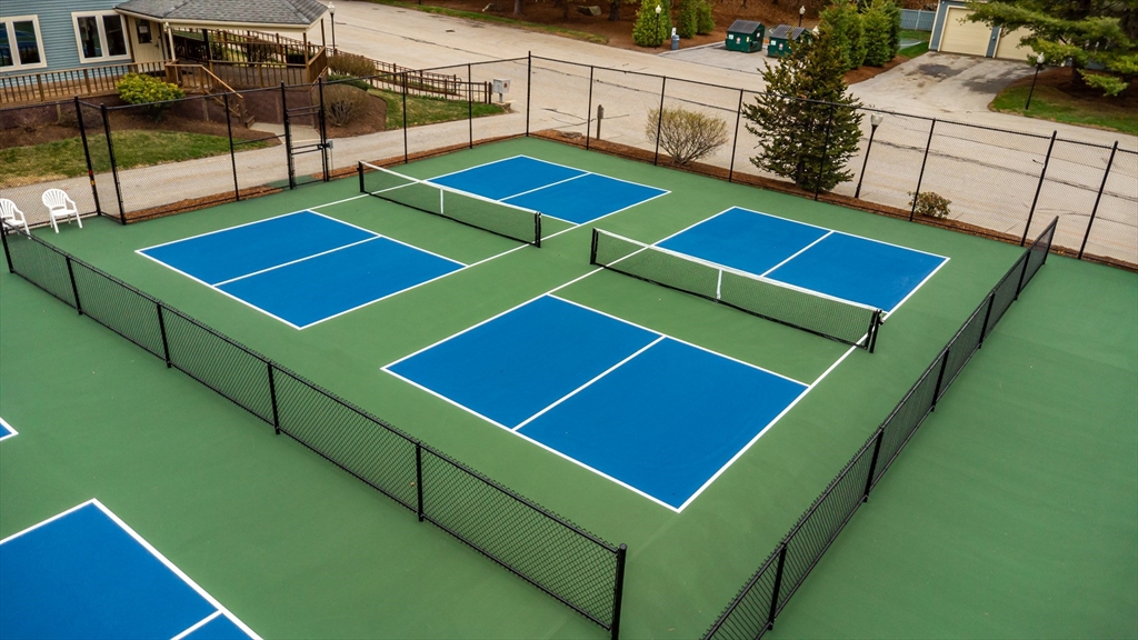 516 Ridgefield Circle, Unit C Clinton, MA 01510 - Photo 34 of 36 a room with pool table and windows