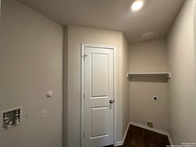 a view of hallway with shower